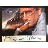 A un-framed signed colour photograph "Jaws" by Roy Schneider dated 2006