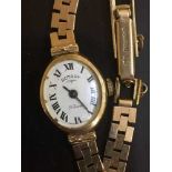 A lady's 9ct gold Rotary wristwatch on 9ct gold chain, 14.