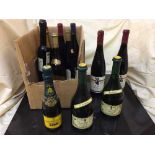 A box of twelve bottles of assorted red and white wines, rose,