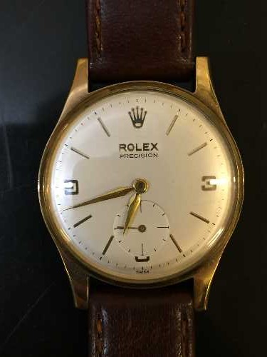 A Gents 9ct gold Rolex Precision Wristwatch, case 31mm, silvered dial with subsidiary seconds,