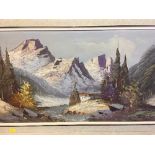 A decorative oval gilt framed mirror, framed oil on canvas of a winter mountain landscape,