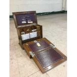 A Victorian mahogany fitted correspondence cabinet including calendar, folding rule,