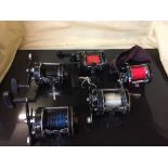 A basket of five Abu Garcier Ambassadeur multiplier fishing reels