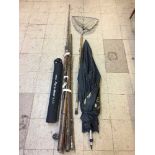 A bundle of split cane sea rods, landing net,