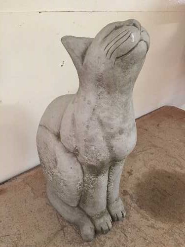 A garden figure - happy cat