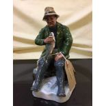 A Royal Doulton figure - A good catch HN 2258