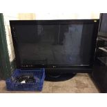 An LG 42 inch plasma TV with lead and remote