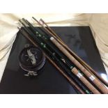 Three assorted fishing rods - two piece split cane fly rod and a bakelite Alvex fishing reel