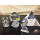 An Egyptian pyramid glass paperweight, a Disney Mickey Mouse glass paperweight,