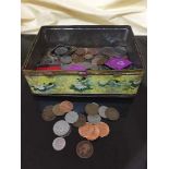 A tin of a large quantity of assorted British coins