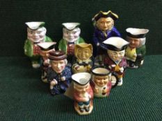 A tray of ten character jugs, Burlington ware, Woods and Son etc. (one musical).