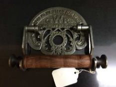 A reproduction metal Great Western Railway toilet roll holder