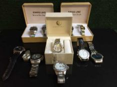 A collection of lady's and gent's wrist watches including two boxed sets of Swiss Line watches