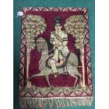 A fringed Persian pictorial rug/wall hanging, depicting a nobleman on horseback, 88cm by 63cm.