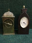 A twentieth century brass mantel clock together with one other (2)