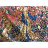 An early 20th century hanging tapestry depicting lady in a garden