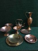 A tray of brass comports, copper and brass plates, copper and brass vase,