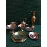 A tray of brass comports, copper and brass plates, copper and brass vase,