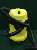 A Karcher WD3 vacuum cleaner