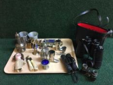 A tray of binoculars, pair of opera glasses, jar of coins, plated cutlery,