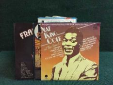 A box of lps, Bing Crosby, Nat King Cole together with a quantity of 45's, Rod Stewart,