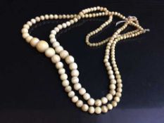 Two antique ivory necklaces