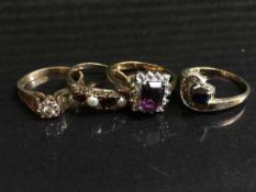 A 9ct gold and diamond ring, a sapphire and diamond ring,