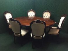 An Italian style pedestal dining table and six chairs