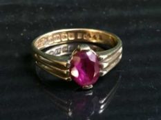 An 18ct gold synthetic ruby set ring CONDITION REPORT: Description changed gemstone