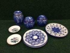 A pair of pottery blue and white glazed plates,