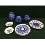 A pair of pottery blue and white glazed plates,