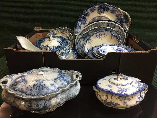 A box of assorted early 20th century blue and white china including Copeland twin handled serving