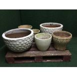 Six assorted circular garden planters