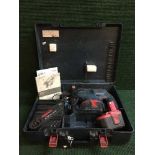 A Bosch JBH 24 VF hammer drill with battery and charger in case