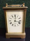 A French brass striking carriage clock, Retailed by Goldsmiths and Co.