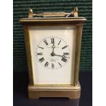 A French brass striking carriage clock, Retailed by Goldsmiths and Co.