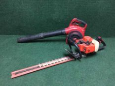 A Toro petrol leaf blower together with a Castor petrol hedge trimmer