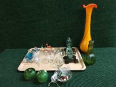 A tray of two Victorian glass dumps, paperweights, animal ornaments,