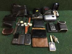 A box of cased Tegner binoculars, assorted cameras, mobile phones, pen knives,
