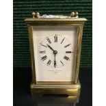 A French striking brass carriage clock, twin barrel movement with platform escapement,