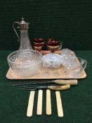 A tray of claret jug, lead crystal water jug, sherry glasses, carving set,
