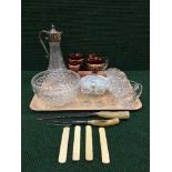 A tray of claret jug, lead crystal water jug, sherry glasses, carving set,