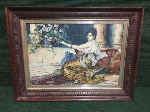 H. Chapman : A maiden playing a lute, watercolour, signed, dated 1909, framed.