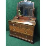 A Victorian inlaid mahogany dressing chest