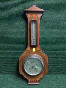 An Victorian inlaid mahogany barometer