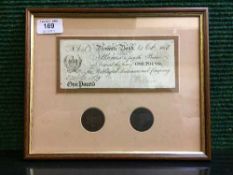 A framed Newark Bank promissory £1 note dated 1808 and two Newark tokens