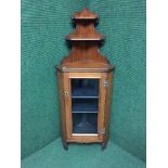 A Victorian mahogany glazed door corner cabinet