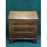 An Edwardian inlaid mahogany bureau