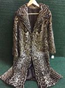 A good quality Ocelot fur coat, circa 1960's, with CITES Article 10 Certificate No.