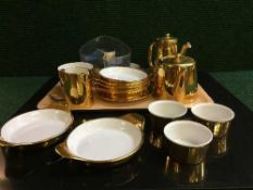 A tray of Royal Worcester gilt tea china and table ware